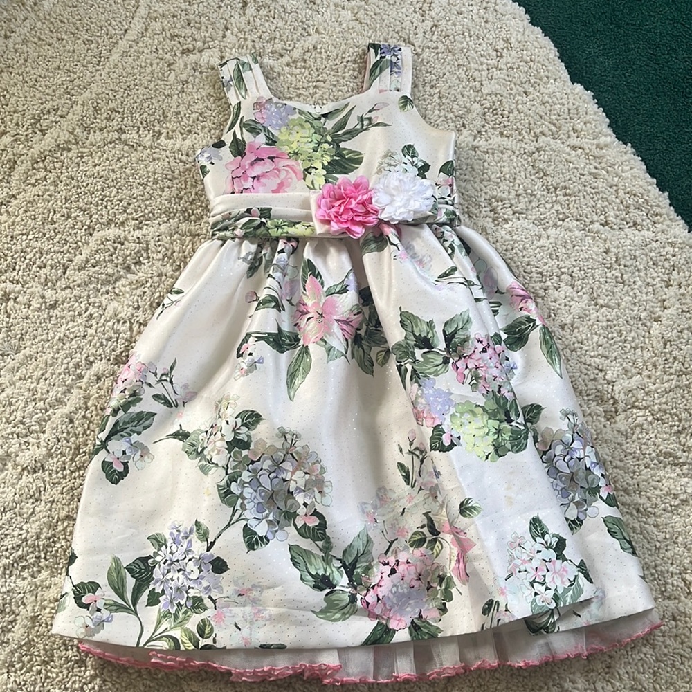 Girls dress with floral details and sparkle